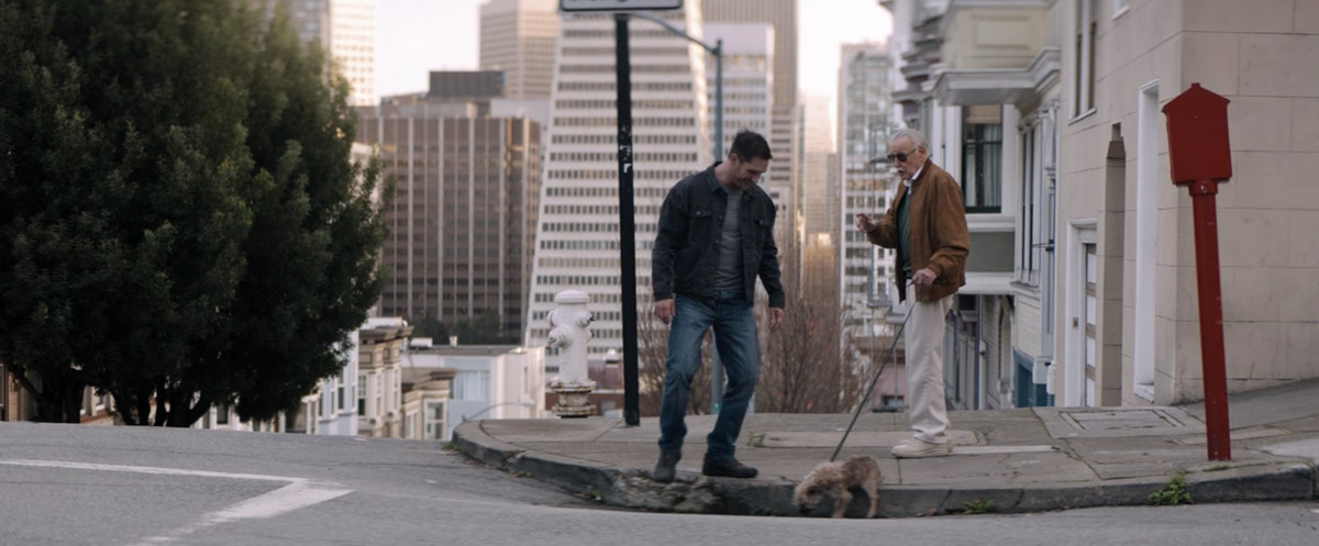 Eddie encounters an old man walking his dog on a corner in San Francisco