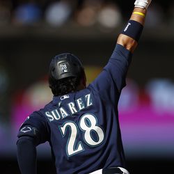 SEATTLE, WASHINGTON - SEPTEMBER 07: Eugenio Suarez #28 of the Seattle Mariners celebrates his home run during the seventh inning against the Chicago White Sox at T-Mobile Park on September 07, 2022 in Seattle, Washington.