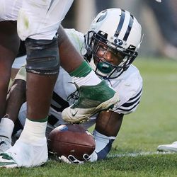 Brigham Young Cougars running back Jamaal Williams (21) looks for the touchdown call against the Michigan State Spartans  in East Lansing, MI on Saturday, Oct. 8, 2016. BYU won 31-14.