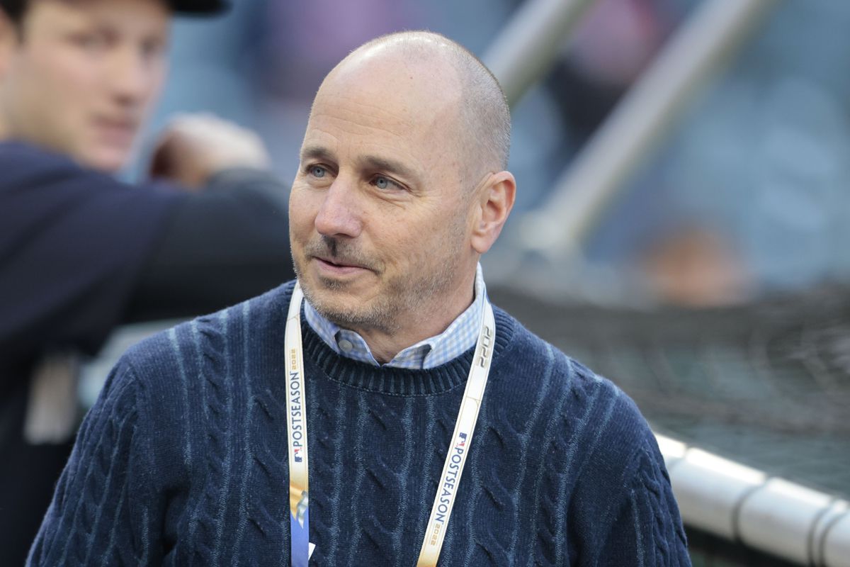 New York Yankees GM Brian Cashman watches batting practice before Game 3 of ALDS