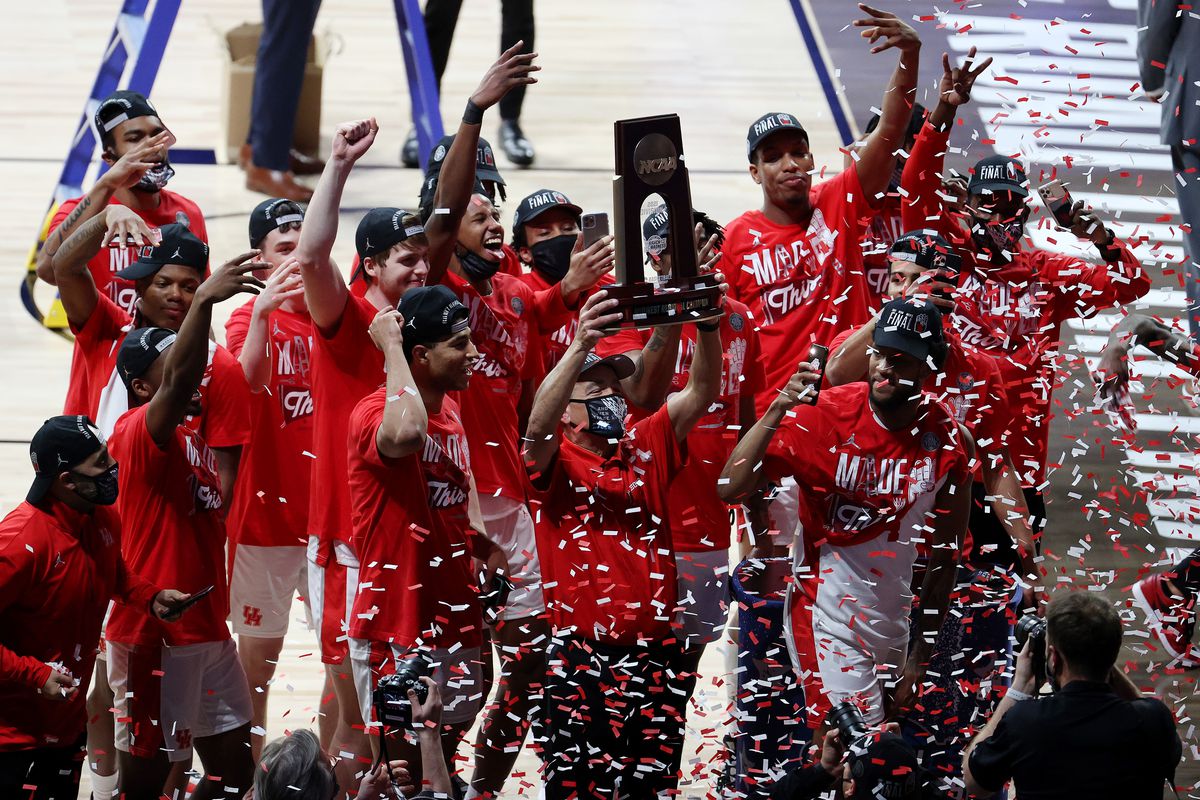 The Houston Cougars celebrate after defeating the Oregon State Beavers in the Elite Eight round of the 2021 NCAA Men’s Basketball Tournament at Lucas Oil Stadium on March 29, 2021 in Indianapolis, Indiana.