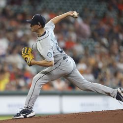 Jul 31, 2022; Houston, Texas, USA; Seattle Mariners starting pitcher George Kirby (68) pitches against the Houston Astros in the first inning at Minute Maid Park. Mandatory Credit: Thomas Shea