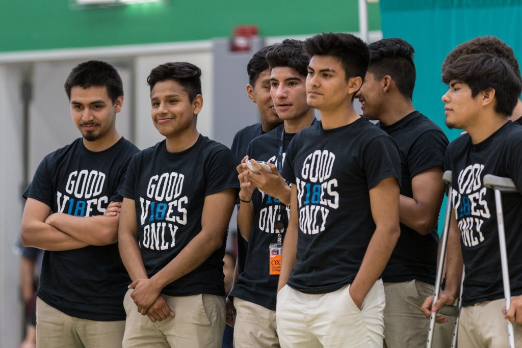 Alan Platon (second from left), a “Dreamer” who graduated earlier this month from Muchin College Prep High School, prepares to perform with his advisory group as part of the Chicago school’s college signing day. | Erin Brown / Sun-Times
