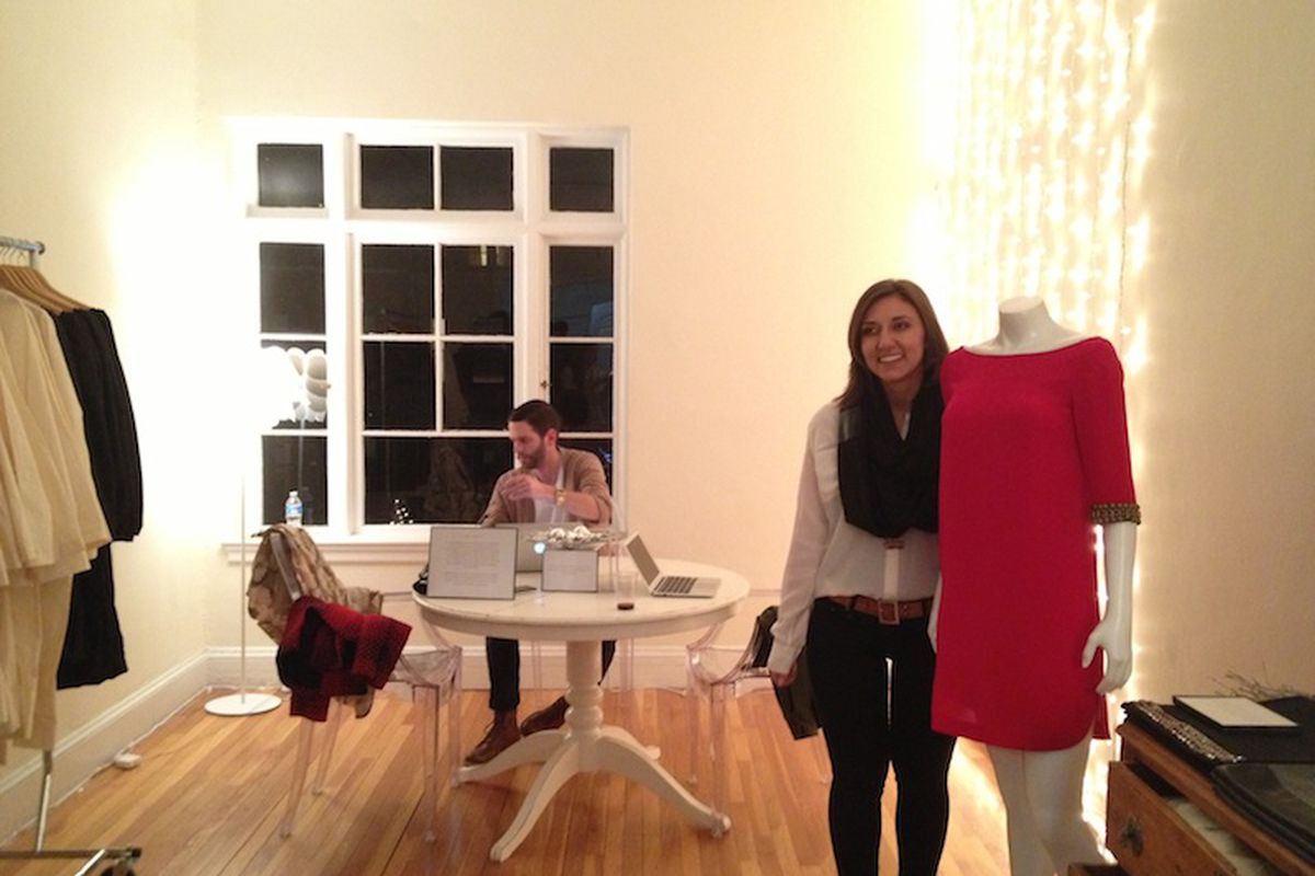 Bow and Drape founder Aubrie Pagano with a mannequin wearing her "Twiggy" dress silhouette.