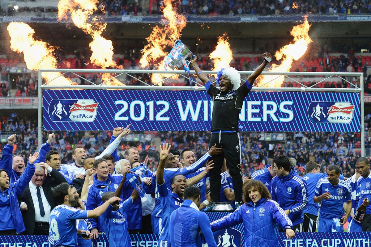 LONDON, ENGLAND - MAY 05:  Michael Essien of Chelsea celebrates with the trophy during the FA Cup with Budweiser Final match between Liverpool and Chelsea at Wembley Stadium on May 5, 2012 in London, England.  (Photo by Shaun Botterill/Getty Images)