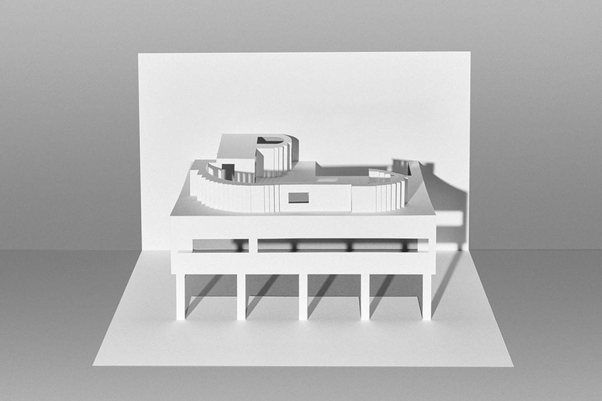 Paper cut out model of a multi-level building.
