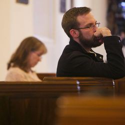 Charlie Knuth listens Tuesday, April 16, 2013, at the Cathedral Church of St. Mark in Salt Lake City for a special service for those affected by the bombings at the Boston Marathon.