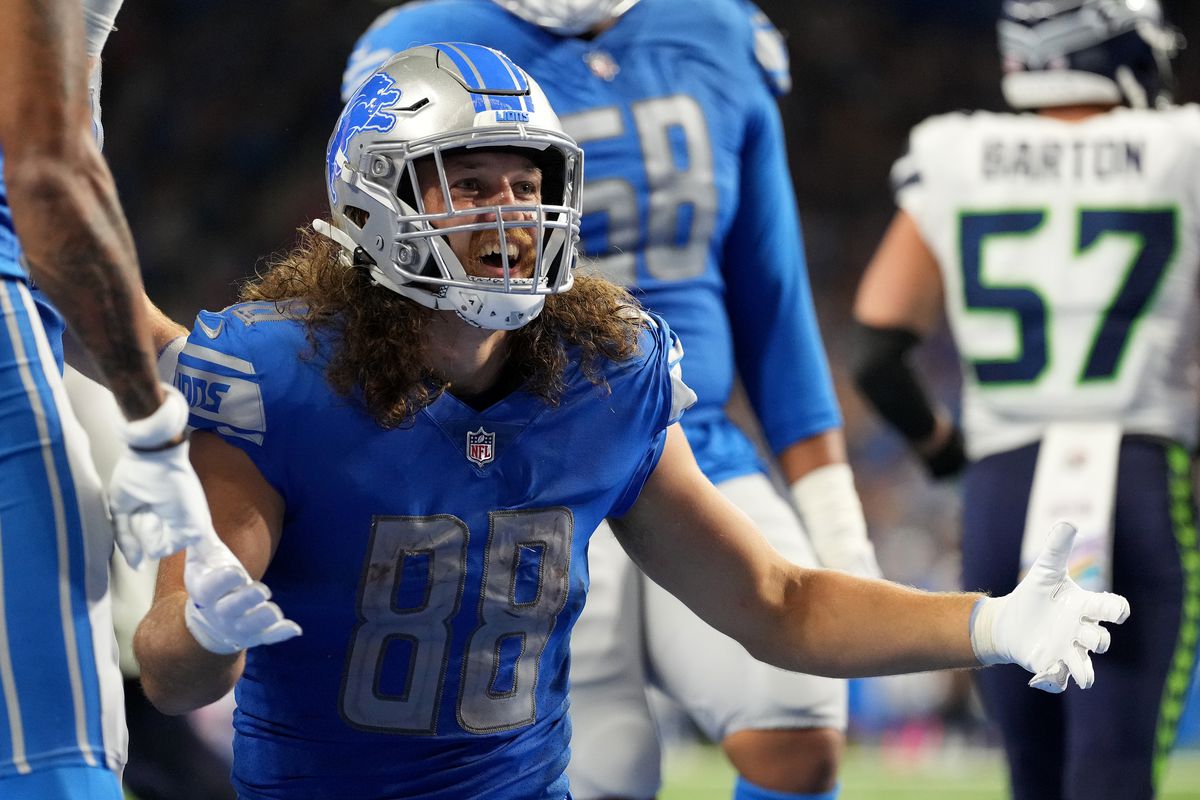 T.J. Hockenson #88 of the Detroit Lions celebrates a two-point conversion against the Seattle Seahawks during the third quarter at Ford Field on October 02, 2022 in Detroit, Michigan.