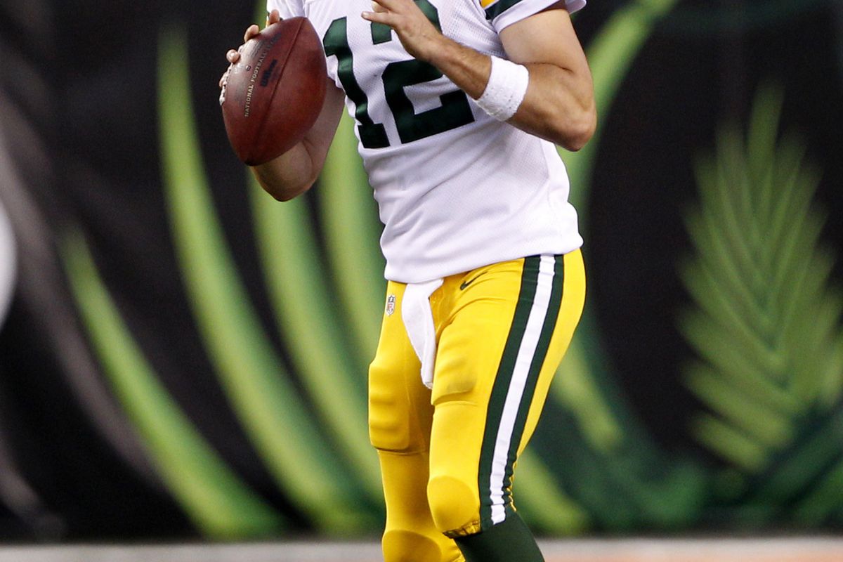 Aug 23, 2012; Cincinnati, OH, USA; Green Bay Packers quarterback Aaron Rodgers (12) passes the ball to during the first half against the Cincinnati Bengals at Paul Brown Stadium. Mandatory Credit: Frank Victores-US PRESSWIRE