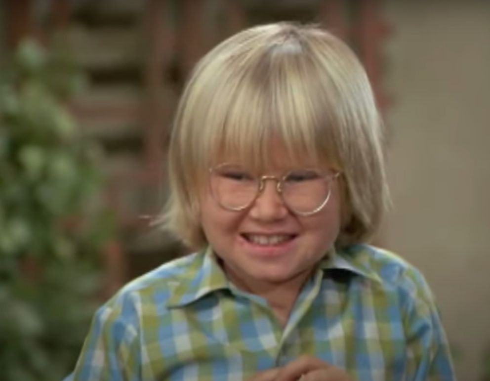 blonde moppet-headed cousin oliver from brady bunch giggling like a fiend