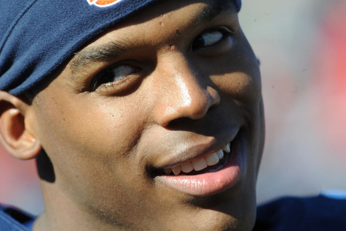 AUBURN AL - NOVEMBER 6:  Quarterback Cam Newton #2 of the Auburn Tigers watches a replay of a touchdown run against the Chattanooga Mocs November 6 2010 at Jordan-Hare Stadium in Auburn Alabama.  (Photo by Al Messerschmidt/Getty Images)