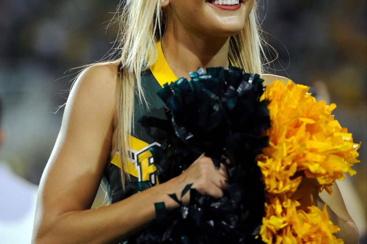 Sep 15, 2012; Waco, TX, USA; Baylor Bears cheerleader roots for her team as they face the Sam Houston State Bearkats during the fourth quarter at Floyd Casey Stadium. The Bears defeated the Bearkats 43-28. Mandatory Credit: Jerome Miron-US PRESSWIRE