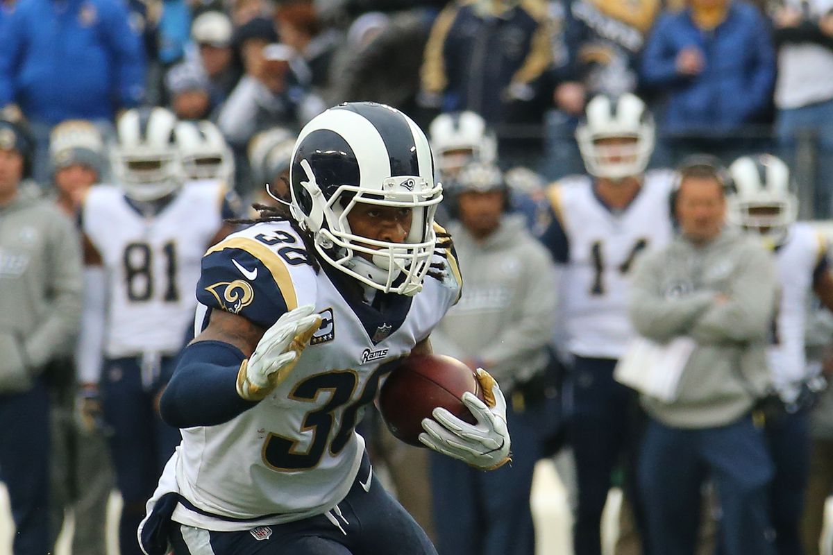 Los Angeles Rams RB runs against the Tennessee Titans in Week 16