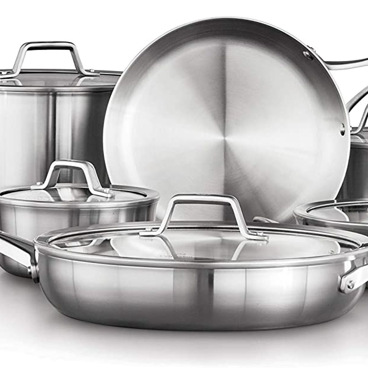 A set of stainless steel pots and pans