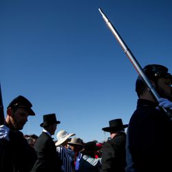 Historical re-enactors carry rifles during the Spike 150 celebration at Golden Spike National Historic Park at Promontory Summit on Friday, May 10, 2019.
