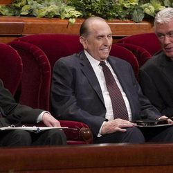 The First Presidency, President Thomas S. Monson and his counselors Henry B. Eyring and President Dieter F. Uchtdorf, take their seats on the stand for the afternoon session Saturday, April 6, 2013 of the 183th Annual General Conference of The Church of Jesus Christ of Latter-day Saints in the Conference Center.