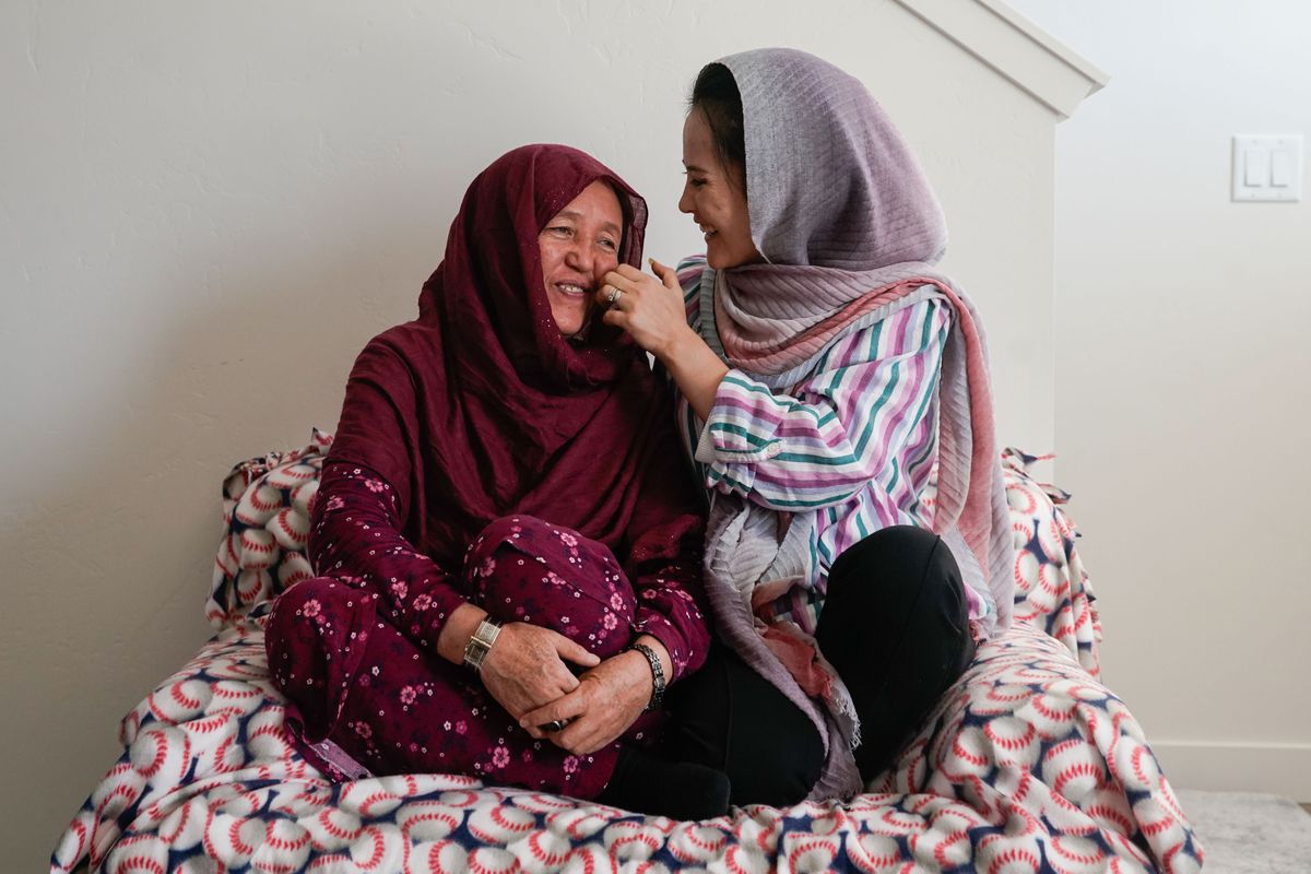 Afghan refugee Hawa Sultani, left, talks with her daughter, Shazia&nbsp;Kakaie, while posing for a portrait at their house in North Salt Lake on Tuesday, Nov. 23, 2021. Following the Taliban takeover of Kabul, Afghanistan, Shazia was separated from her husband, Azim. They were reunited in Utah on Oct. 30.
