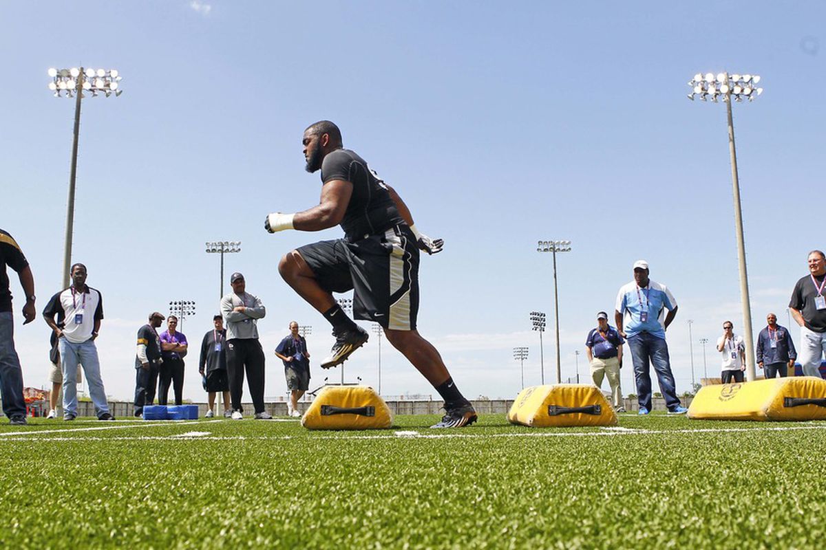 Mar 22, 2012; Baton Rouge, LA, USA; LSU defensive tackle Michael Brockers goes through drills during the pro day at the LSU Tigers indoor practice facility. Mandatory Credit: Crystal Logiudice-US PRESSWIRE
