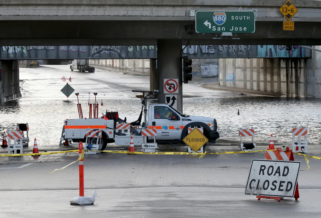 Flooding closes a road in West Oakland, California.
