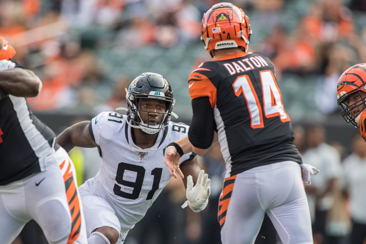 Jacksonville Jaguars defensive end Yannick Ngakoue rushes Cincinnati Bengals quarterback Andy Dalton in the second half at Paul Brown Stadium.