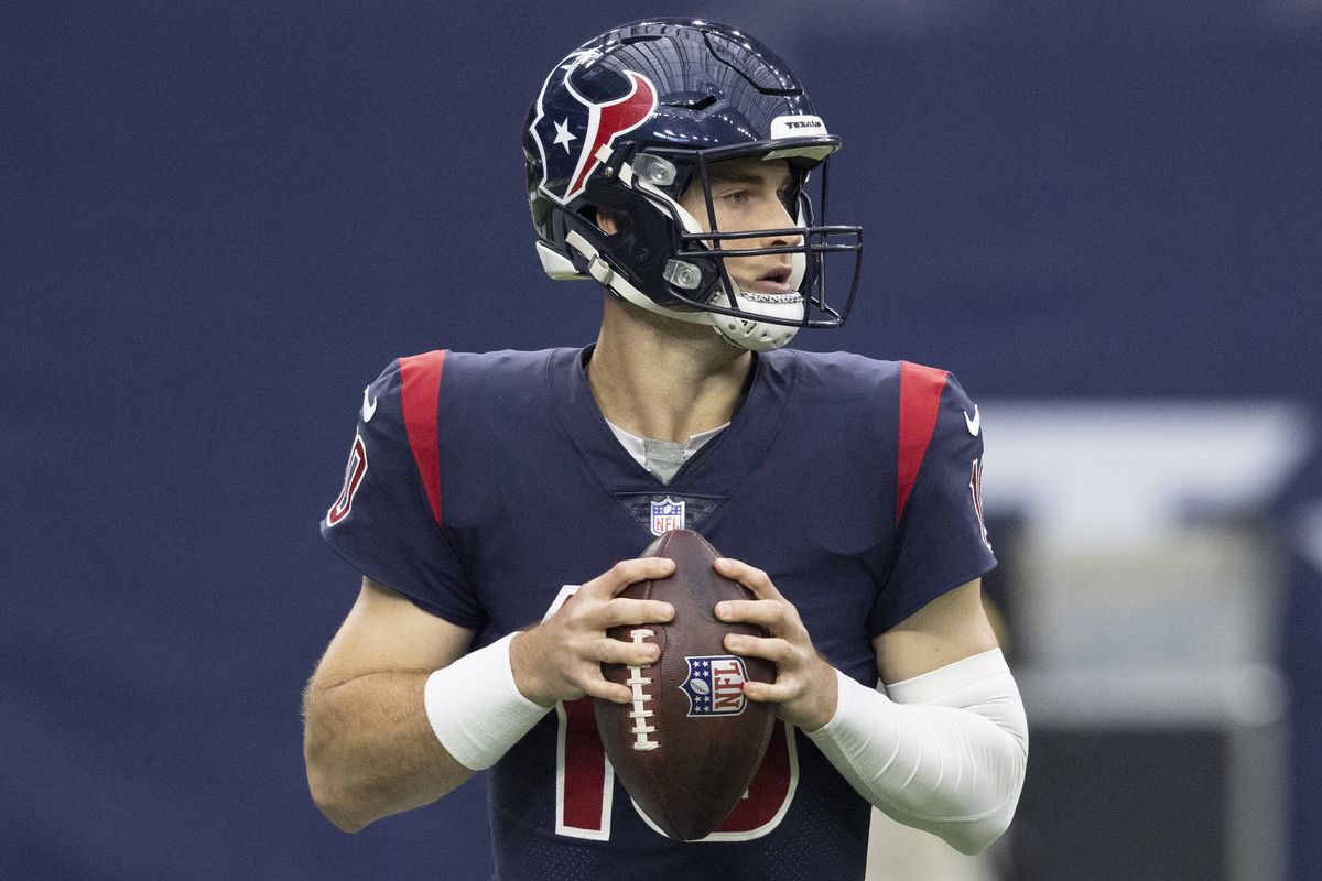 Houston Texans quarterback Davis Mills (10) drops back to pass against the Los Angeles Chargers in the second quarter at NRG Stadium.
