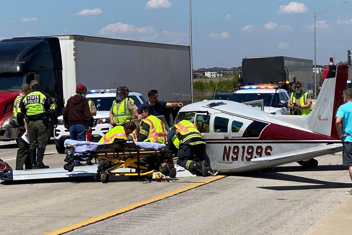 Authorities respond after a small plane landed in I-355 May 13, 2021.