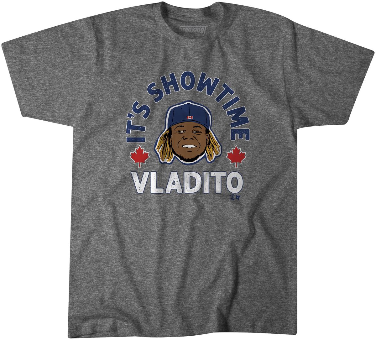 An illustration of Blue Jays’ player Vladimir Guerrero’s face and head, wearing a blue baseball cap with a flag of Canada on it, is surrounded by the words “It’s Showtime, Vladito” in blue and white text as well as two red maple leaves, all on a grey t-sh