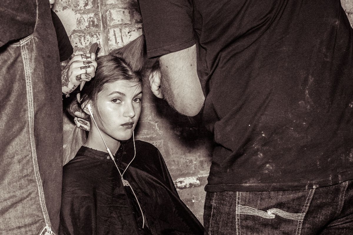 A model getting her hair done at NYFW. Photo by <a href="http://peladopelado.com/">Driely S.</a>