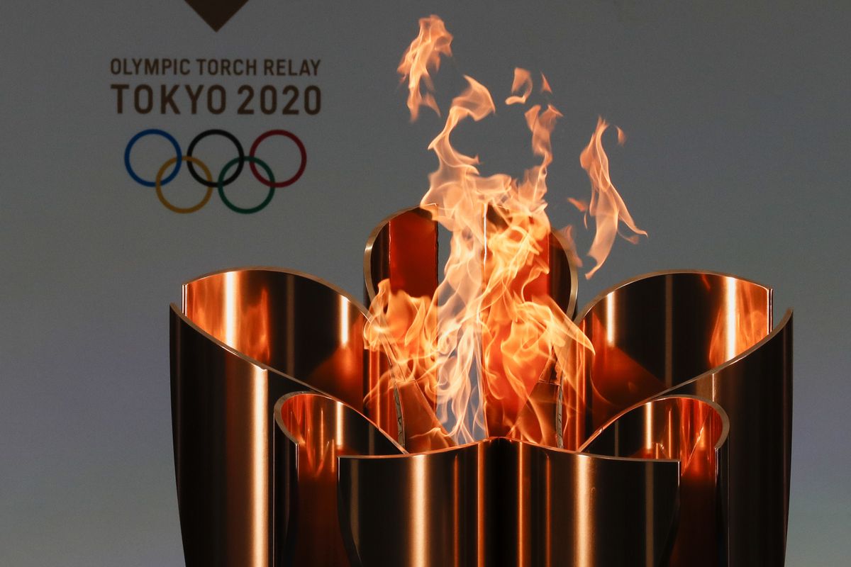 In this March 25, 2021, file photo, the celebration cauldron is seen lit on the first day of the Tokyo 2020 Olympic torch relay in Naraha, Fukushima prefecture, northeastern Japan.