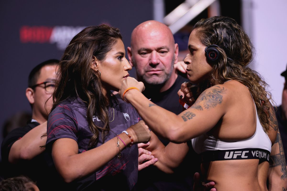 Julianna Pena and Amanda Nunes of Brazil face off during the UFC 277 ceremonial weigh-in at American Airlines Center on July 29, 2022 in Dallas, Texas.