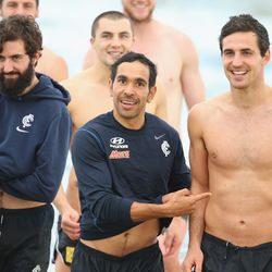 Eddie Betts (C) of the Blues gestures towards Kane Lucas (R) during a Carlton Blues AFL Recovery Session.