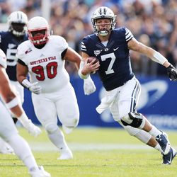Brigham Young Cougars quarterback Taysom Hill (7) runs against the Southern Utah Thunderbirds  in Provo on Saturday, Nov. 12, 2016.