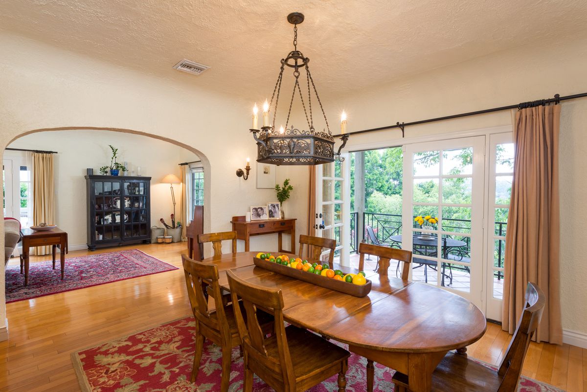 Dining room with wrought-iron light fixture