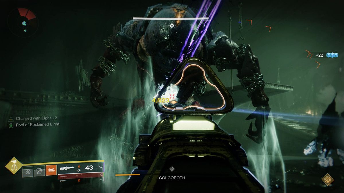 A Guardian shoots at Golgoroth’s chest in Destiny 2’s King’s Fall raid