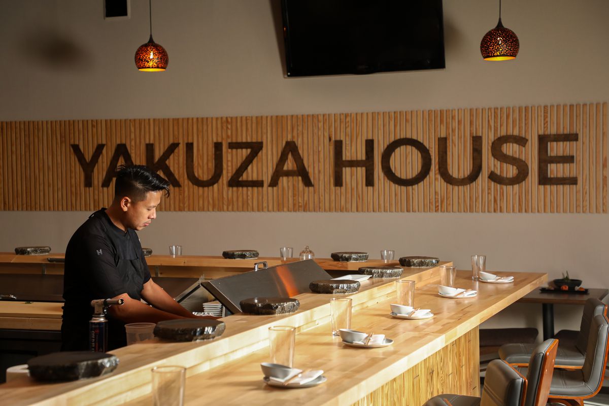 Chef Huy Pham works at the sushi bar at Yakuza House.