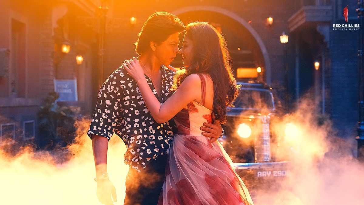 Shah Rukh Khan and Nayanthara embrace in a smoky setting in Jawan.