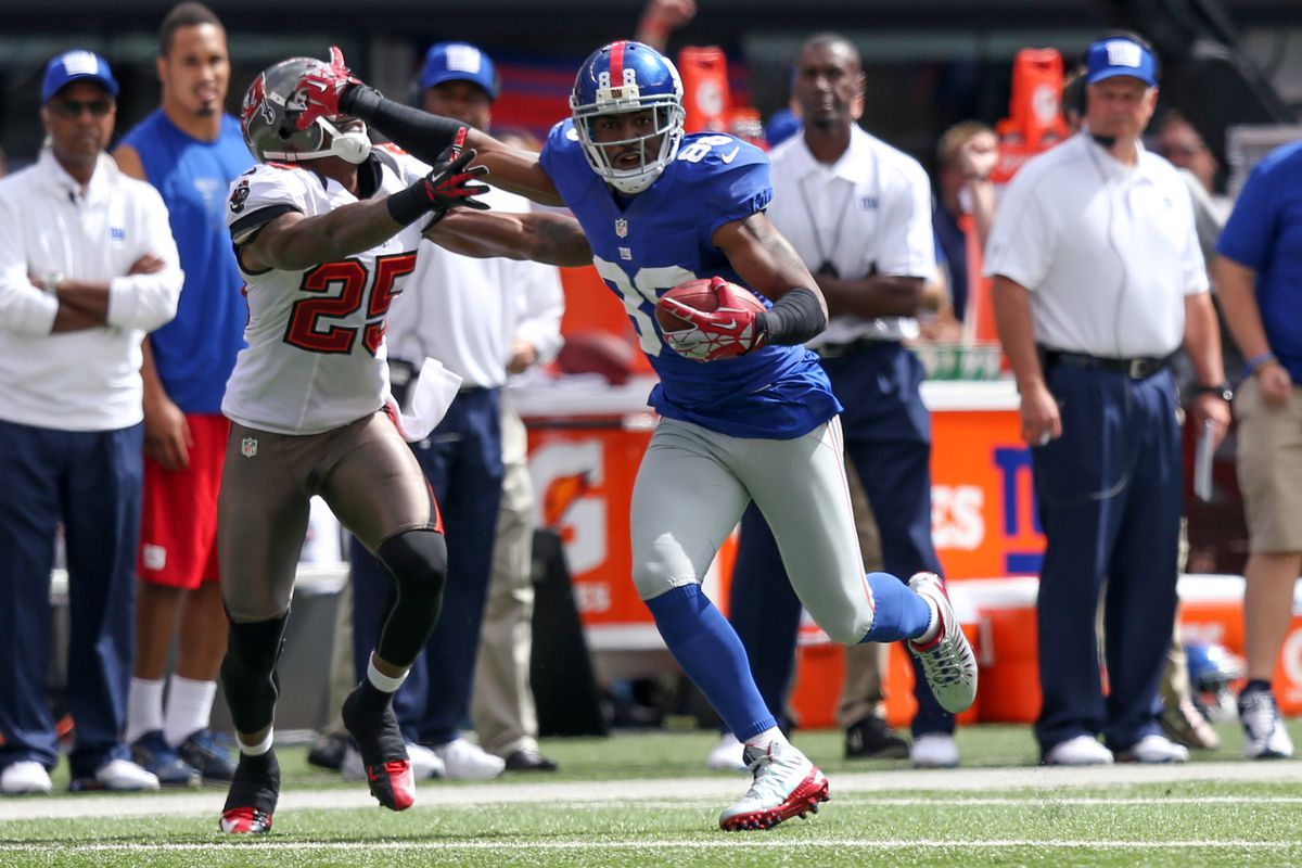 Sep 16, 2012; East Rutherford, NJ, New York Giants wide receiver Hakeem Nicks (88) holds off Tampa Bay Buccaneers cornerback Aqib Talib (25) during the first quarter at MetLife Stadium. Mandatory Credit: Anthony Gruppuso-US PRESSWIRE