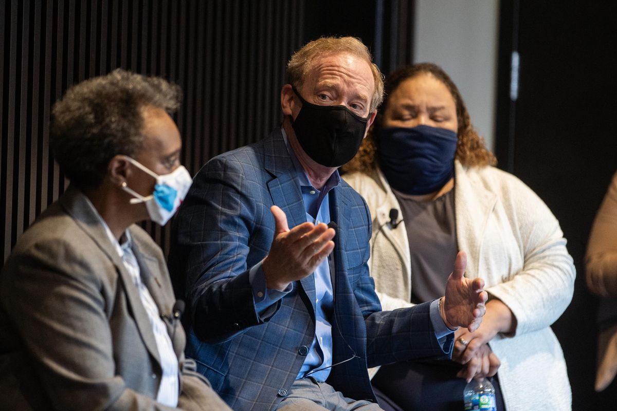 Microsoft President Brad Smith speaks with Mayor Lori Lightfoot during a launch of Accelerate Chicago at the North Lawndale Employment Network. The program hopes to bridge a digital divide and address systemic inequities.Public and private organizations launched “Accelerate Chicago,” a partnership between Chicago Mayor Lori Lightfoot and Microsoft Corp. that will provide digital skills to job seekers in Chicago, Friday afternoon, Oct. 1, 2021.