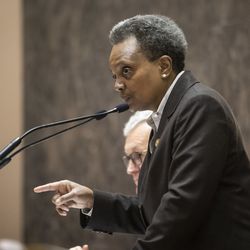 Mayor Lori Lightfoot spars with Ald. Jason Ervin (28th) during the monthly Chicago City Council meeting, where aldermen were scheduled to vote on attempt by the Black Caucus to delay sales of recreational marijuana in Chicago for six months to give African American and Hispanic people a chance to get a piece of the action, at City Hall, Wednesday, Dec. 18, 2019.