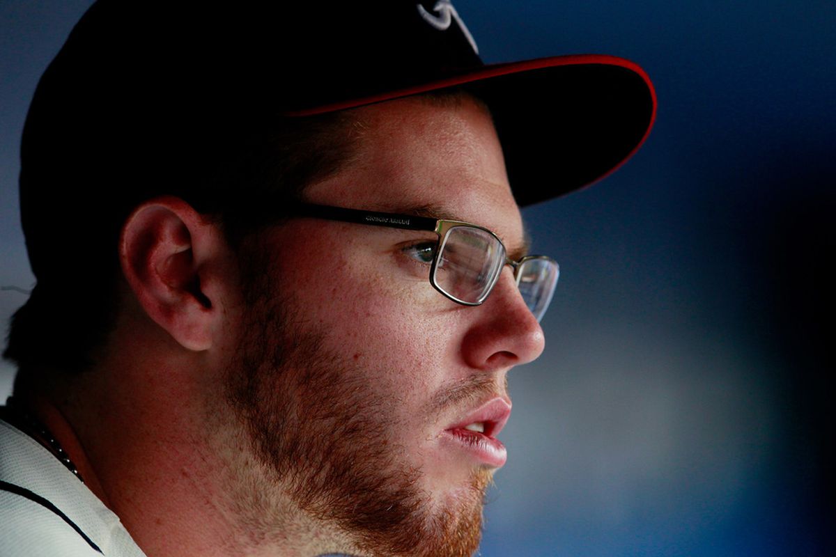 ATLANTA, GA - MAY 27:  Freddie Freeman #5 of the Atlanta Braves sits in the dugout prior to the game against the Washington Nationals at Turner Field on May 27, 2012 in Atlanta, Georgia.  (Photo by Kevin C. Cox/Getty Images)