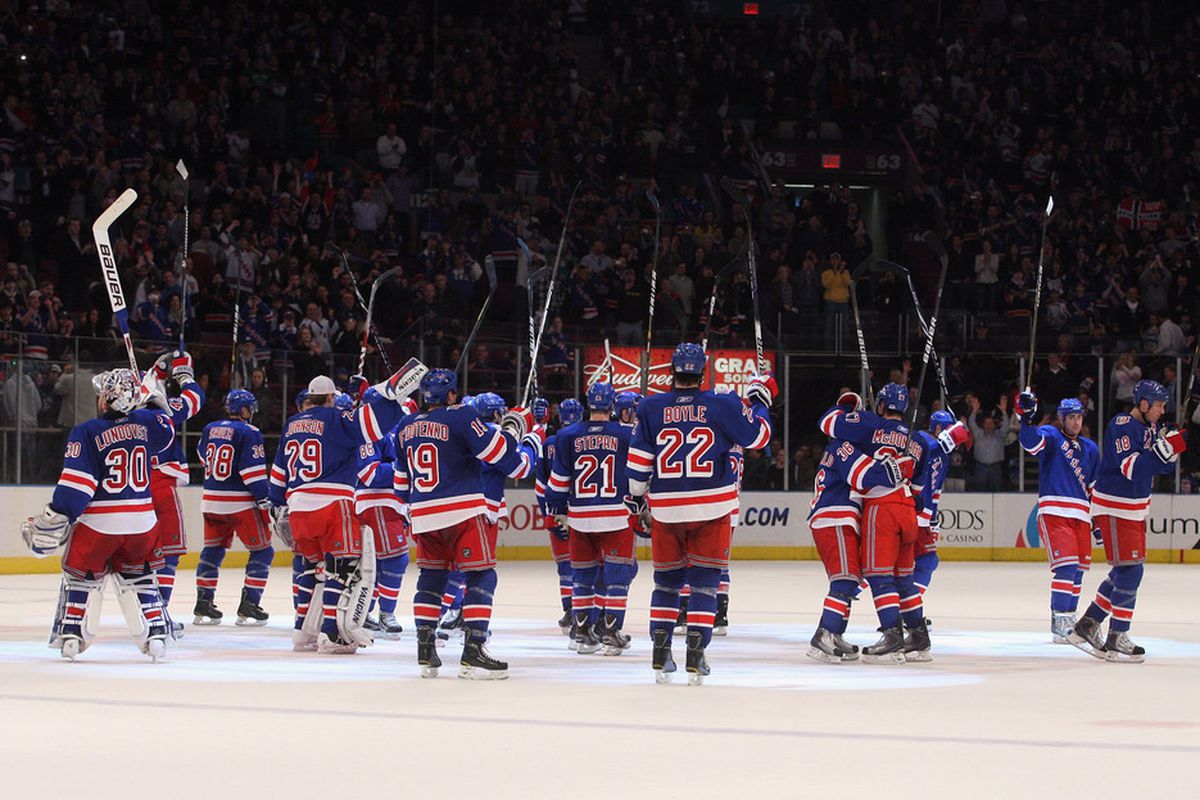 NEW YORK, NY - APRIL 09: The New York Rangers celebrate their 5-2 win over the New Jersey Devils  at Madison Square Garden on April 9, 2011 in New York City.  (Photo by Jonathan Klein/Getty Images)