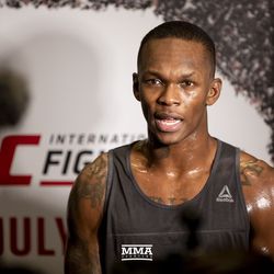 Israel Adesanya answers questions from the media at TUF 27 Finale workouts.