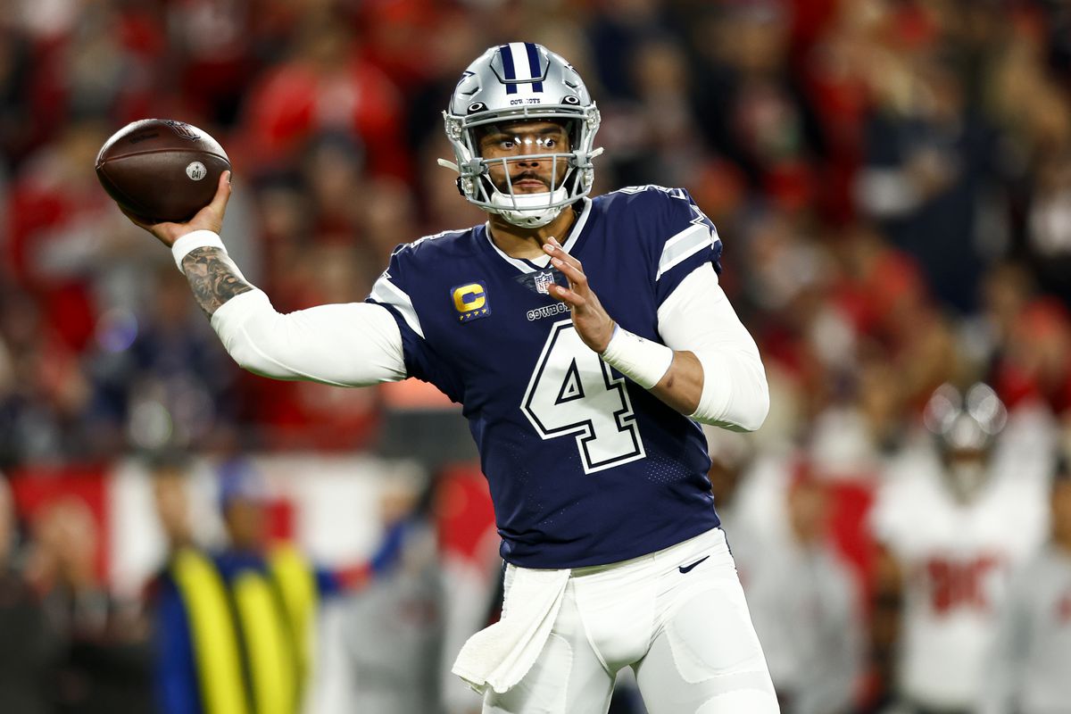 TAMPA, FL - JANUARY 16: Dak Prescott #4 of the Dallas Cowboys throws a pass during the first quarter of an NFL wild card playoff football game against the Tampa Bay Buccaneers at Raymond James Stadium on January 16, 2023 in Tampa, Florida.