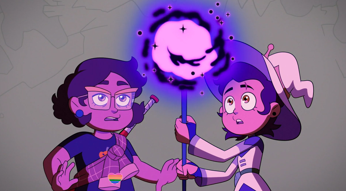 Luz has a purple staff with a glowing orb at the tip. She looks at it with awe.Next to her her mother Camilla also looks surprised