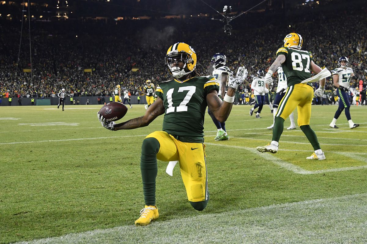 Davante Adams #17 of the Green Bay Packers celebrates after running in a 40-yard touchdown catch against the Seattle Seahawks in the third quarter of the NFC Divisional Playoff game at Lambeau Field on January 12, 2020 in Green Bay, Wisconsin.