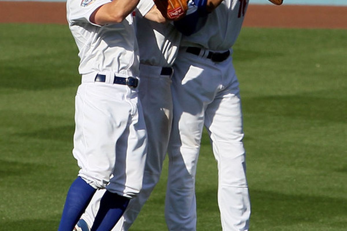 Matt Kemp and Andre Ethier, seen here, and Manny Ramirez, had reason to celebrate yesterday.