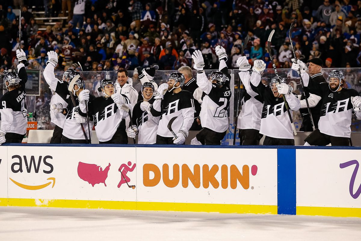 Feb 15, 2020; Colorado Springs, Colorado, USA; Los Angeles Kings players celebrate after an empty net goal against the Colorado Avalanche in the third period during a Stadium Series hockey game at U.S. Air Force Academy Falcon Stadium.