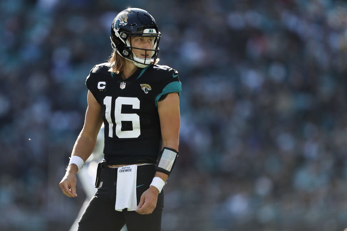 JACKSONVILLE, FLORIDA - DECEMBER 18: Trevor Lawrence #16 of the Jacksonville Jaguars looks on during the first half against the Dallas Cowboys at TIAA Bank Field on December 18, 2022 in Jacksonville, Florida.