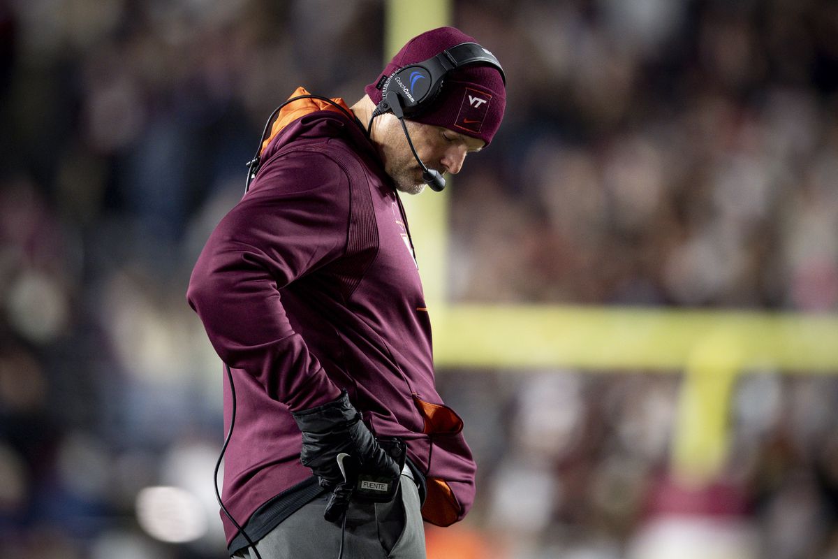 Head coach Justin Fuente of the Virginia Tech Hokies looks on during the second half of a game against the Boston College Eagles at Alumni Stadium on November 05, 2021 in Chestnut Hill, Massachusetts.