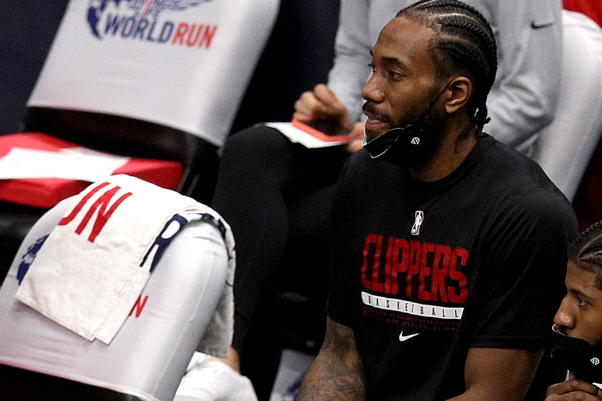Kawhi Leonard of the LA Clippers sits on the bench during the fourth quarter of an NBA game against the New Orleans Pelicans at Smoothie King Center on April 26, 2021 in New Orleans, Louisiana.